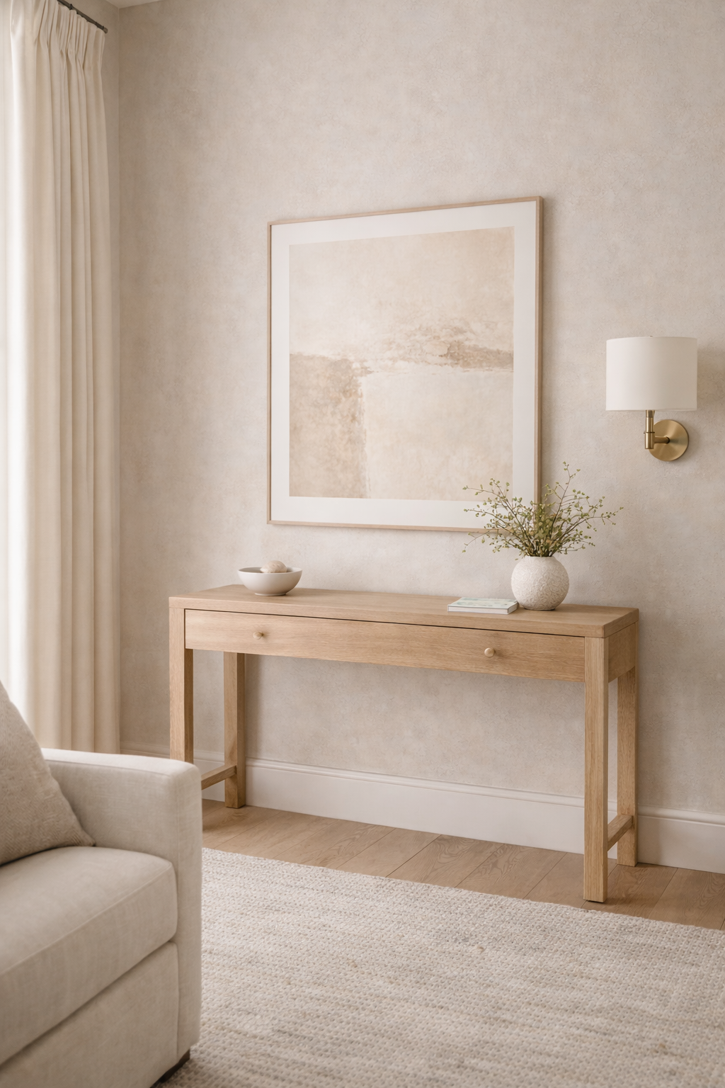 Large-scale art perfectly centered above furniture with generous spacing and calm negative space
